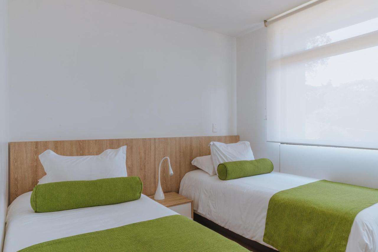 Travelers Rio Verde Living Suites Rionegro Exterior photo